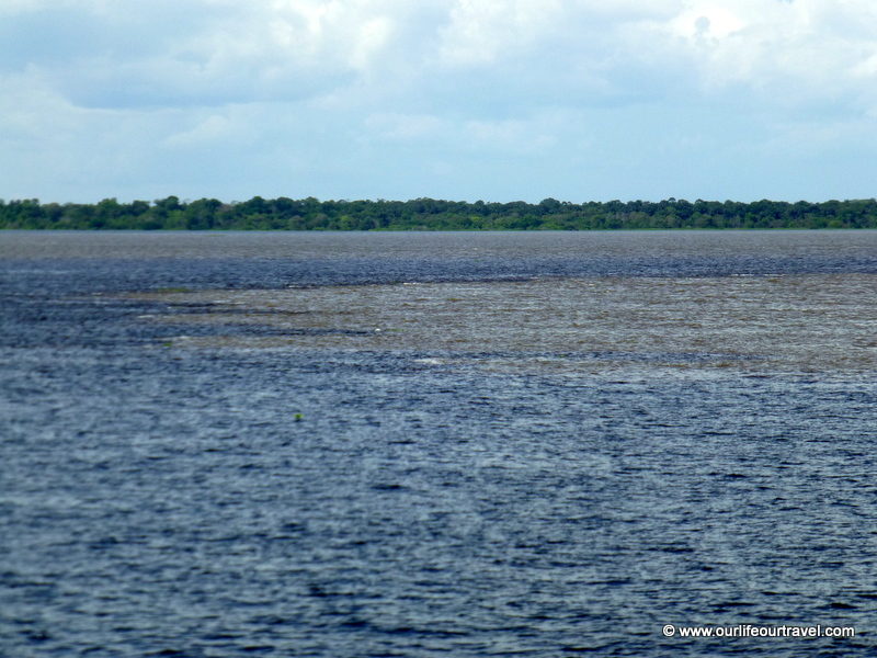 Meeting of waters. Tabatinga - Manaus boat ride