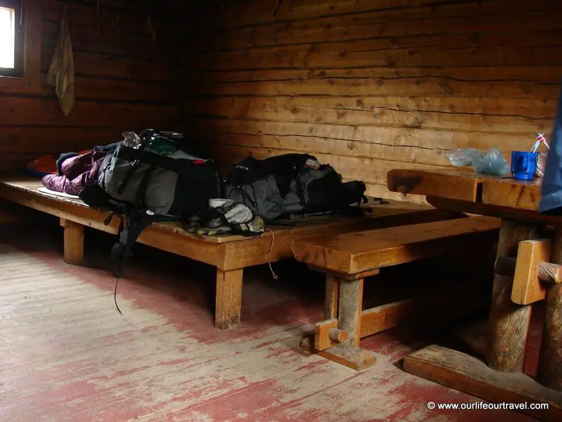 An open wilderness hut: benches for sleeping