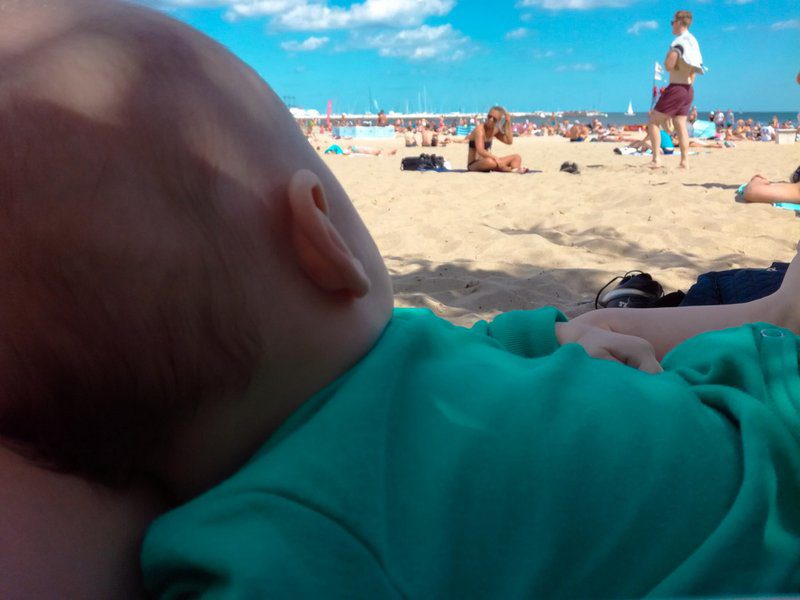 Baby enjoys the beach in Gdansk